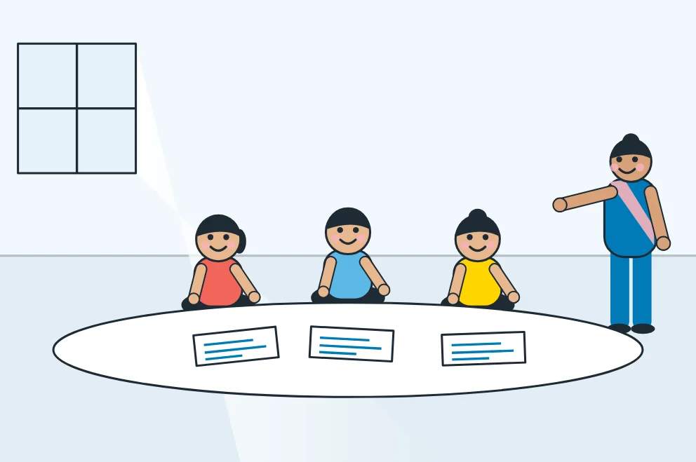 Illustration: UKG children practising writing with their teacher